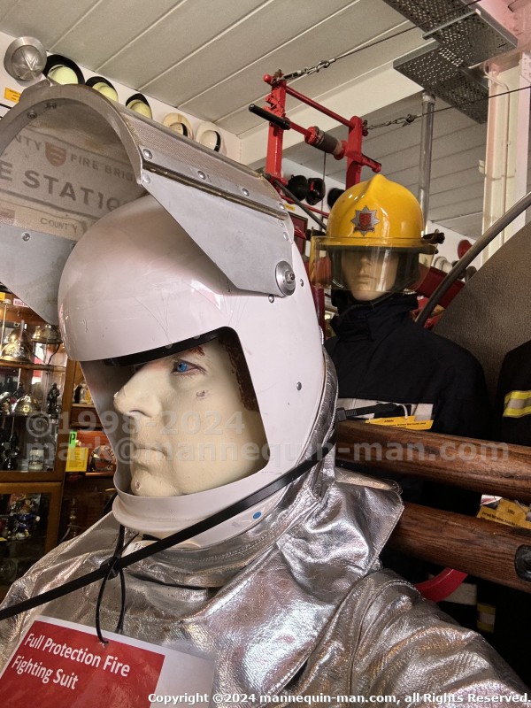 Mannequin demonstrating hazard protection clothing. This mannequin is wearing a Heat Resistant Aluminized Foil Refinery Proximity Suit. - Essex Fire Museum Living Mannequin Wearing A Heat Resistant Aluminized Foil Refinery Proximity Suit Mannequin demonstrating hazard protection clothing. This mannequin is wearing a Heat Resistant Aluminized Foil Refinery Proximity Suit. - Essex Fire Museum Living Mannequin Wearing A Heat Resistant Aluminized Foil Refinery Proximity Suit