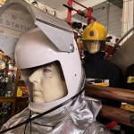Essex Fire Museum Living Mannequin Wearing A Heat Resistant Aluminized Foil Refinery Proximity Suit mannequin-man performming as a Museum Dummy: Mannequin demonstrating hazard protection clothing. This mannequin is wearing a Heat Resistant Aluminized Foil Refinery Proximity Suit. for Essex Fire Museum on 28/05/2024