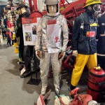 Essex Fire Museum Living Mannequin Wearing A Heat Resistant Aluminized Foil Refinery Proximity Suit mannequin-man performming as a Museum Dummy: Mannequin demonstrating hazard protection clothing. This mannequin is wearing a Heat Resistant Aluminized Foil Refinery Proximity Suit. for Essex Fire Museum on 28/05/2024