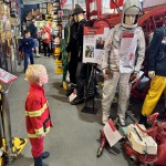 Essex Fire Museum Living Mannequin Wearing A Heat Resistant Aluminized Foil Refinery Proximity Suit mannequin-man performming as a Museum Dummy: Mannequin demonstrating hazard protection clothing. This mannequin is wearing a Heat Resistant Aluminized Foil Refinery Proximity Suit. for Essex Fire Museum on 28/05/2024