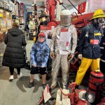 Essex Fire Museum Living Mannequin Wearing A Heat Resistant Aluminized Foil Refinery Proximity Suit mannequin-man performming as a Museum Dummy: Mannequin demonstrating hazard protection clothing. This mannequin is wearing a Heat Resistant Aluminized Foil Refinery Proximity Suit. for Essex Fire Museum on 28/05/2024