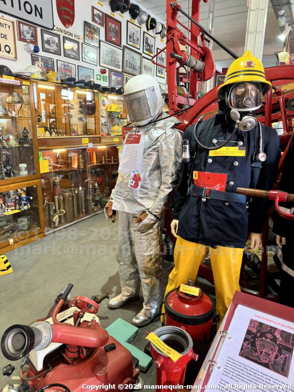 Mannequin demonstrating hazard protection clothing. This mannequin is wearing a Heat Resistant Aluminized Foil Refinery Proximity Suit. - Essex Fire Museum Living Mannequin Wearing A Heat Resistant Aluminized Foil Refinery Proximity Suit Mannequin demonstrating hazard protection clothing. This mannequin is wearing a Heat Resistant Aluminized Foil Refinery Proximity Suit. - Essex Fire Museum Living Mannequin Wearing A Heat Resistant Aluminized Foil Refinery Proximity Suit