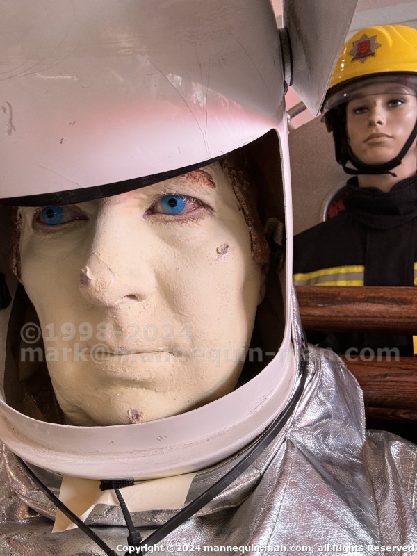 Mannequin demonstrating hazard protection clothing. This mannequin is wearing a Heat Resistant Aluminized Foil Refinery Proximity Suit. - Essex Fire Museum Living Mannequin Wearing A Heat Resistant Aluminized Foil Refinery Proximity Suit Mannequin demonstrating hazard protection clothing. This mannequin is wearing a Heat Resistant Aluminized Foil Refinery Proximity Suit. - Essex Fire Museum Living Mannequin Wearing A Heat Resistant Aluminized Foil Refinery Proximity Suit