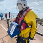 Human Living Mannequin Collects Donations For The Sidmouth Charity Lifeboat As Sid The Mannequin During August Bank Holiday Weekend mannequin-man performming as a Living Mannequin: Became Sid again for the Sidmouth lifeboat collecting donations over two days of the bank holiday weekend for Sidmouth Lifeboat on 26/08/2023