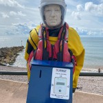 Human Living Mannequin Collects Donations For The Sidmouth Charity Lifeboat As Sid The Mannequin During August Bank Holiday Weekend mannequin-man performming as a Living Mannequin: Became Sid again for the Sidmouth lifeboat collecting donations over two days of the bank holiday weekend for Sidmouth Lifeboat on 26/08/2023