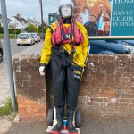 Human Living Mannequin Collects Donations For The Sidmouth Charity Lifeboat As Sid The Mannequin During August Bank Holiday Weekend mannequin-man performming as a Living Mannequin: Became Sid again for the Sidmouth lifeboat collecting donations over two days of the bank holiday weekend for Sidmouth Lifeboat on 26/08/2023