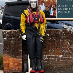 Human Living Mannequin Collects Donations For The Sidmouth Charity Lifeboat As Sid The Mannequin During August Bank Holiday Weekend mannequin-man performming as a Living Mannequin: Became Sid again for the Sidmouth lifeboat collecting donations over two days of the bank holiday weekend for Sidmouth Lifeboat on 26/08/2023