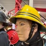 Mannequin wearing a 1976 Nomex jacket, yellow cork helmet and classic yellow PVC leggings.