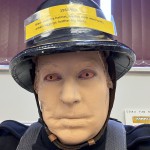 Mannequin Wearing 1950s Firefighter Uniform Black Helmet Essex Fire Museum mannequin-man performming as a Museum Dummy: Mannequin man wearing 1950-1960 firefighter uniform and breathing apparatus amusing the visitors for Essex Fire Museum on 09/04/2024