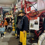 Mannequin Wearing 1950s Firefighter Uniform Black Helmet Essex Fire Museum mannequin-man performming as a Museum Dummy: Mannequin man wearing 1950-1960 firefighter uniform and breathing apparatus amusing the visitors for Essex Fire Museum on 09/04/2024