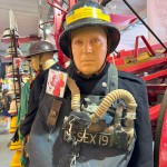 Mannequin Wearing 1950s Firefighter Uniform Mark 5 Proto Breathing Apparatus Yellow Pvc Leggings Black Helmet Essex Fire Museum mannequin-man performming as a Museum Dummy: Mannequin man wearing 1950-1960 firefighter uniform and breathing apparatus amusing the visitors for Essex Fire Museum on 25/02/2024