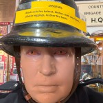 Mannequin Wearing 1950s Firefighter Uniform Mark 5 Proto Breathing Apparatus Yellow Pvc Leggings Black Helmet Essex Fire Museum mannequin-man performming as a Museum Dummy: Mannequin man wearing 1950-1960 firefighter uniform and breathing apparatus amusing the visitors for Essex Fire Museum on 25/02/2024