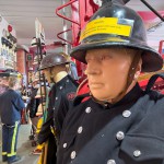 Mannequin man wearing 1950-1960 firefighter uniform and breathing apparatus amusing the visitors
