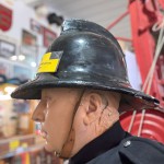 Mannequin Wearing 1950s Firefighter Uniform Mark 5 Proto Breathing Apparatus Yellow Pvc Leggings Black Helmet Essex Fire Museum mannequin-man performming as a Museum Dummy: Mannequin man wearing 1950-1960 firefighter uniform and breathing apparatus amusing the visitors for Essex Fire Museum on 25/02/2024