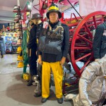 Mannequin Wearing 1950s Firefighter Uniform Mark 5 Proto Breathing Apparatus Yellow Pvc Leggings Black Helmet Essex Fire Museum mannequin-man performming as a Museum Dummy: Mannequin man wearing 1950-1960 firefighter uniform and breathing apparatus amusing the visitors for Essex Fire Museum on 25/02/2024