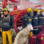 Mannequin Wearing 1950s Firefighter Uniform Mark 5 Proto Breathing Apparatus Yellow Pvc Leggings Black Helmet Essex Fire Museum mannequin-man performming as a Museum Dummy: Mannequin man wearing 1950-1960 firefighter uniform and breathing apparatus amusing the visitors for Essex Fire Museum on 25/02/2024