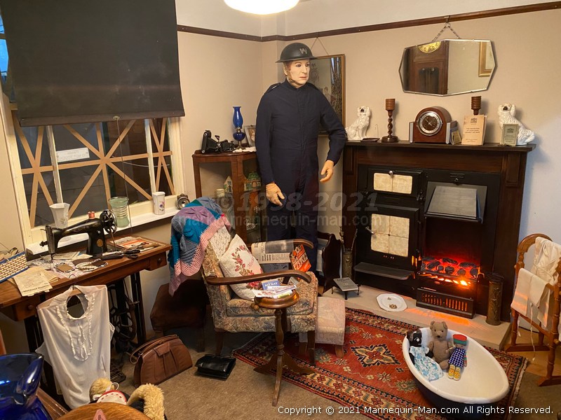 Domestic scene from 1940's living room - WW2 Civil Defence Mannequin at Thorpe Camp Visitor Centre Domestic scene from 1940's living room - WW2 Civil Defence Mannequin at Thorpe Camp Visitor Centre